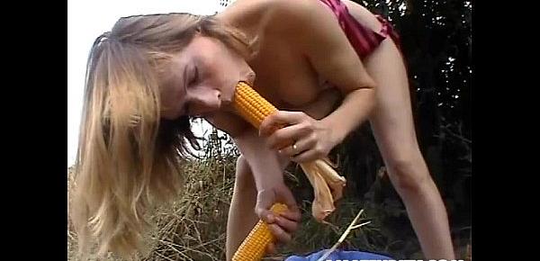  Amateur girlfriend toys her pussy with corn outdoor